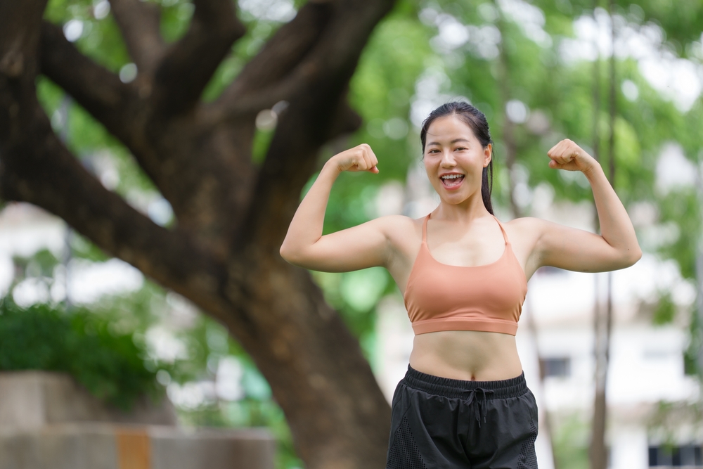 woman after taking peptide stacks for muscle growth in Maryland