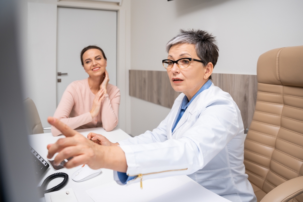 doctor explaining how functional medicine is different than traditional care